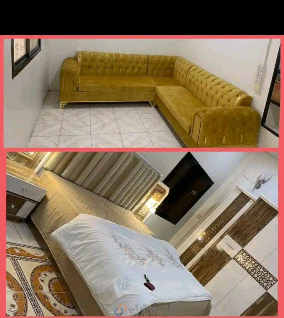 غرفه النوم مع الكنب